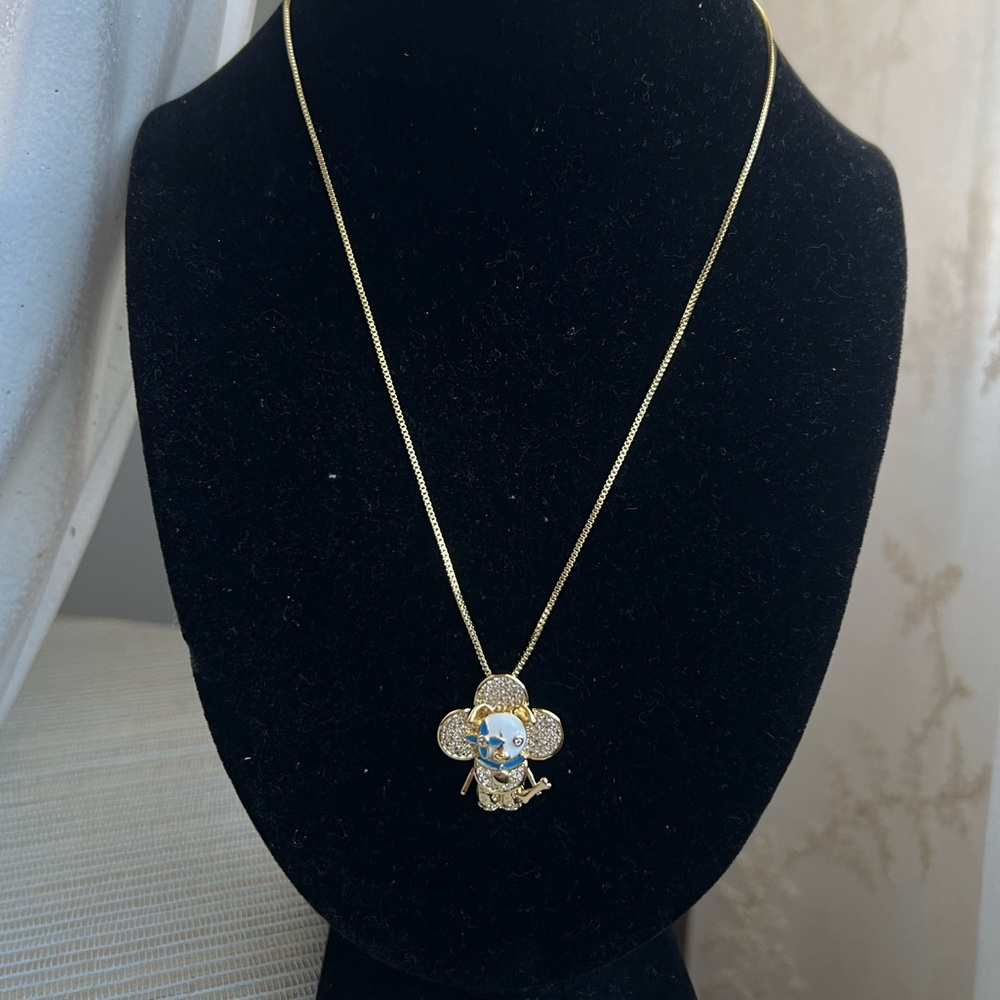 🩷-Gold, blue and white  pavé floral  dog and bone Pendant Necklace